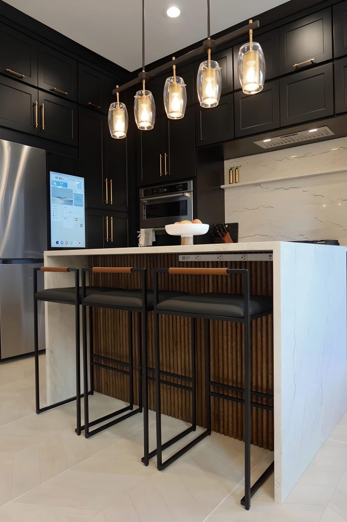 tambour under island detailing in a black and white kitchen