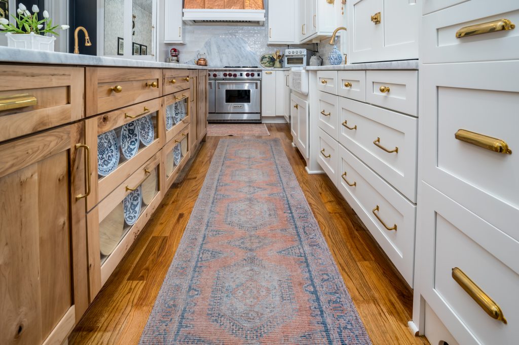 two toned cabinets: wood on left and white on right