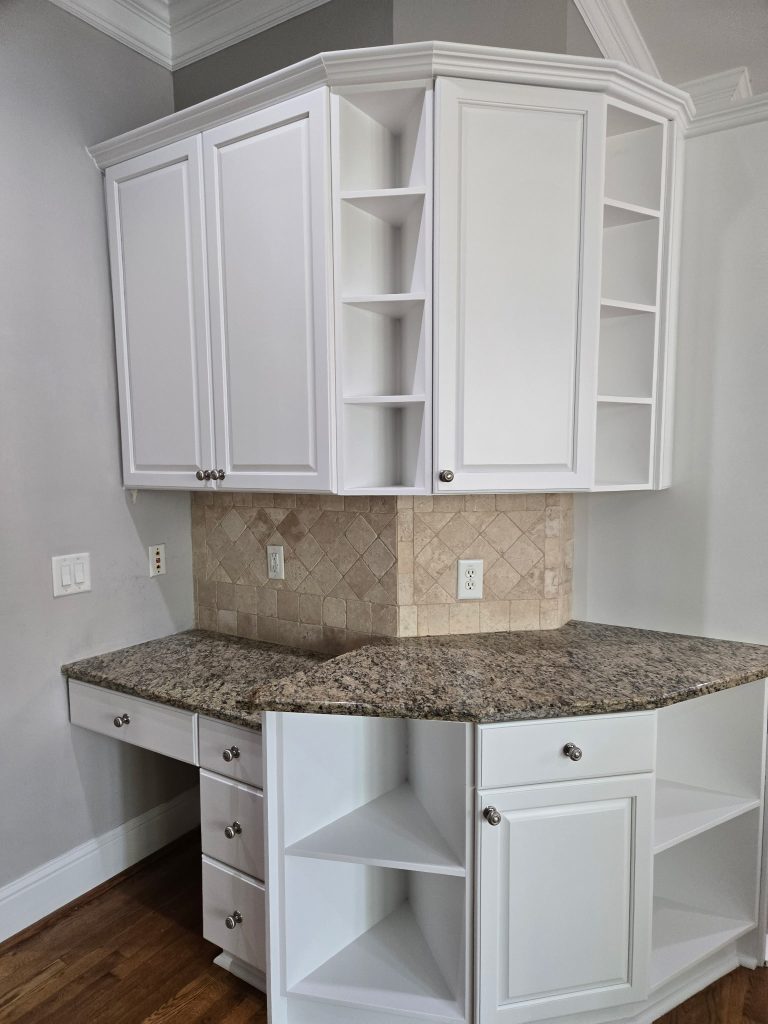 Refinished kitchen with white cabinets